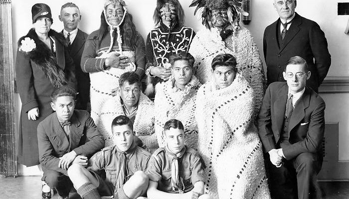 Alumni Association presentation of totem poles to UBC.<br>Photo credit: <a href="https://dx.doi.org/10.14288/1.0019521" target="_blank">UBC Archives</a></center>